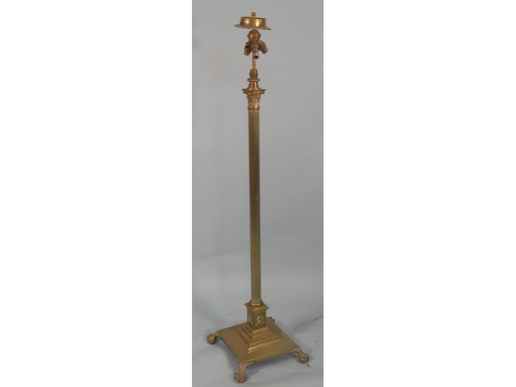 Appraisal: An early thC brass Corinthian column lamp stand on a