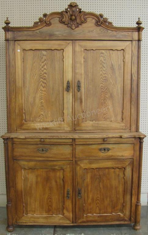 Appraisal: An antique Country French cupboard two-piece construction top with blind