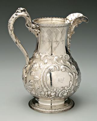 Appraisal: New York silver pitcher baluster form floral repouss body with