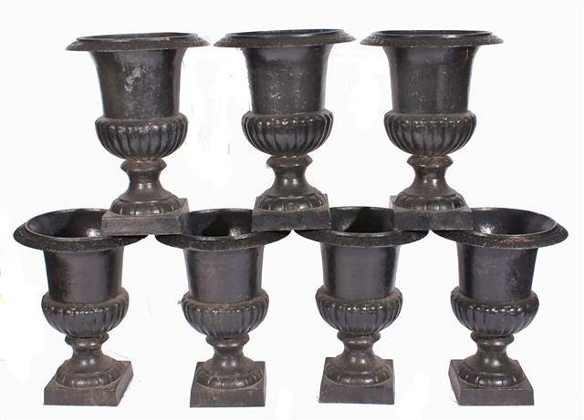 Appraisal: A pair of black painted cast iron campana urns standing