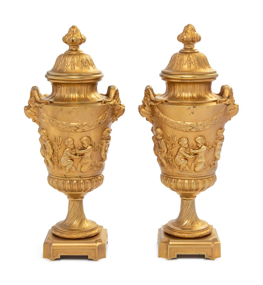 Appraisal: A Pair of Continental Gilt Bronze Covered Urns A Pair