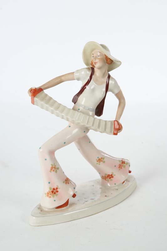 Appraisal: PORCELAIN FIGURE Signed Royal Dux Woman playing an acordian h