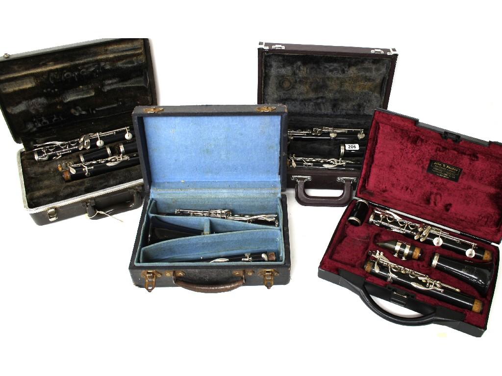 Appraisal: Two ebonite Boosey Hawkes clarinets together with another two ebonite