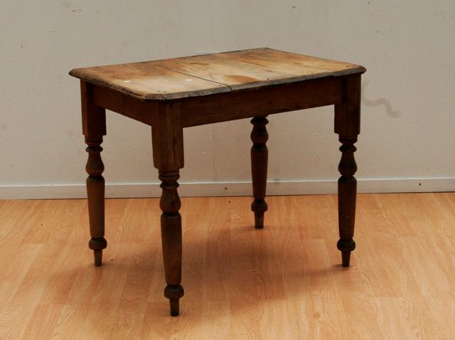 Appraisal: An pine kitchen table with scrubbed top cut from a