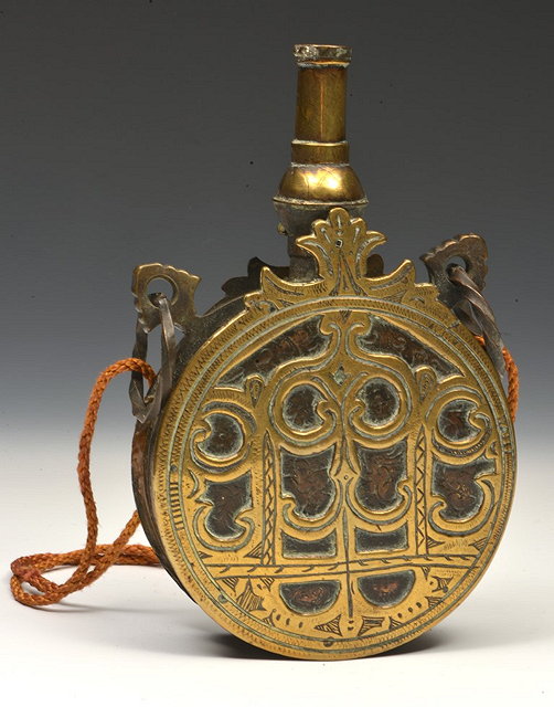 Appraisal: A TURKISH BRASS ENGRAVED FLASK early th Century cm