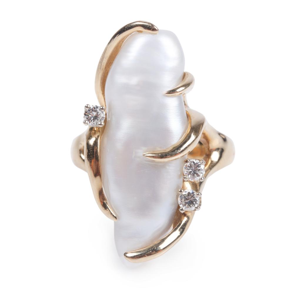 Appraisal: Designer k yellow gold baroque freshwater pearl and diamond ring