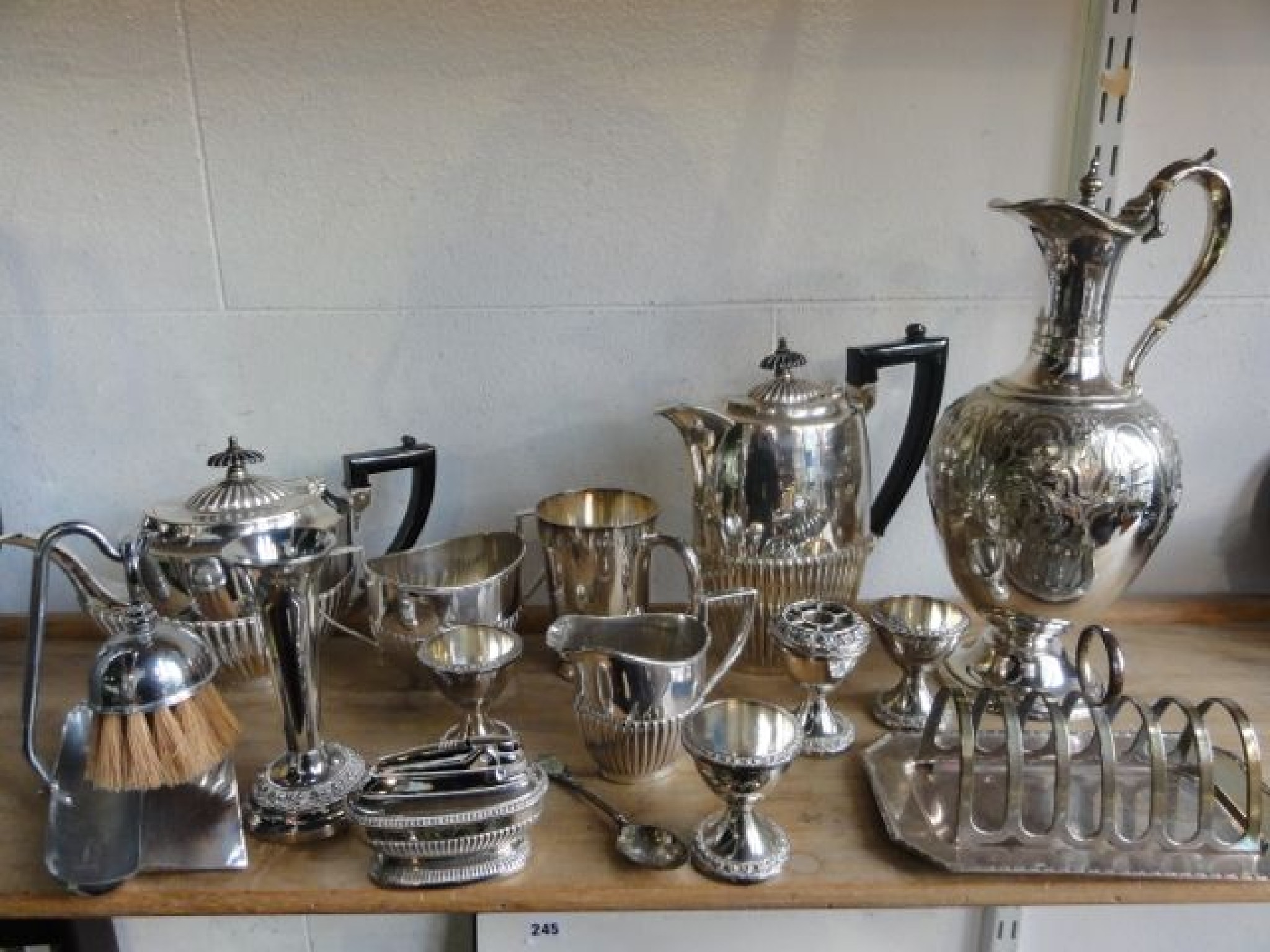 Appraisal: A four piece silver plated tea set comprising teapot hot