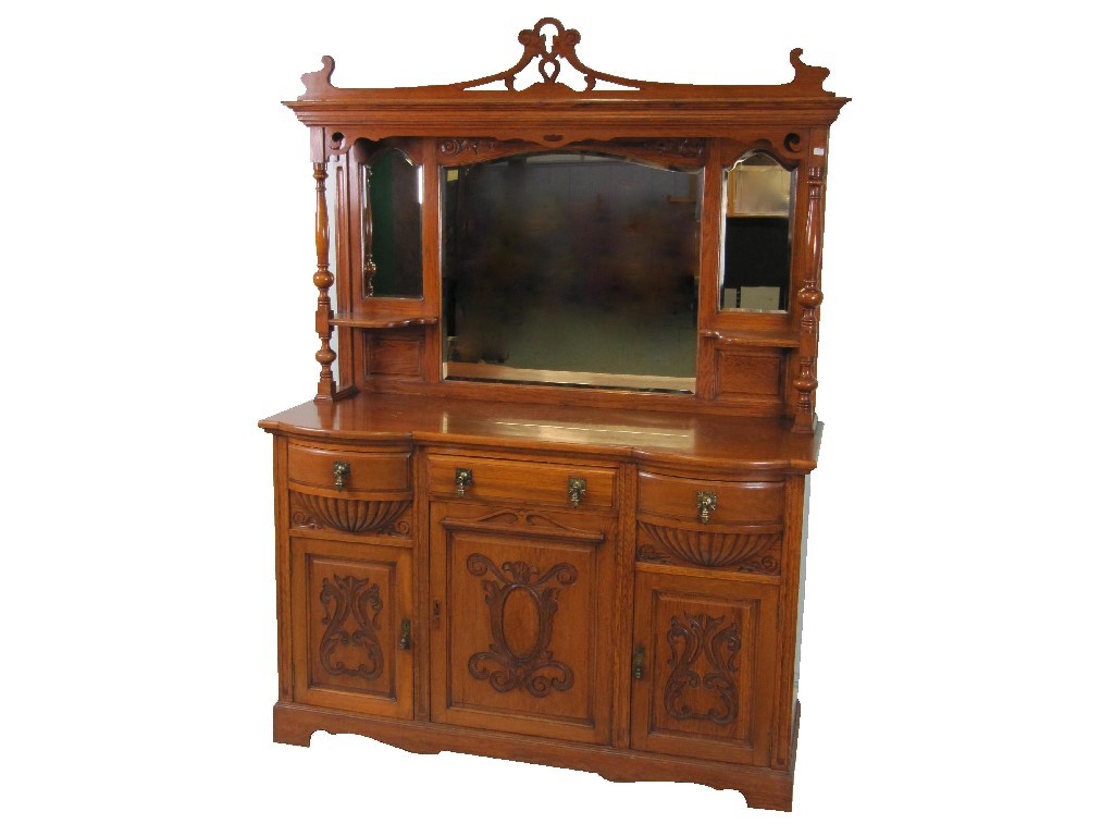 Appraisal: Victorian oak mirrorback sideboard the overmantle mirror raised on a