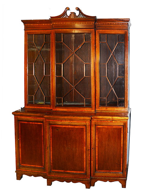 Appraisal: AN EDWARDIAN AND MAHOGANY SATINWOOD CROSSBANDED BREAK FRONT LIBRARY BOOKCASE