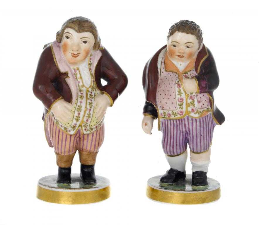 Appraisal: A PAIR OF SAMPSON HANCOCK FIGURES OF PHILOSOPHERS in claret