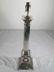 Appraisal: A large and impressive plated corinthian column table lamp on