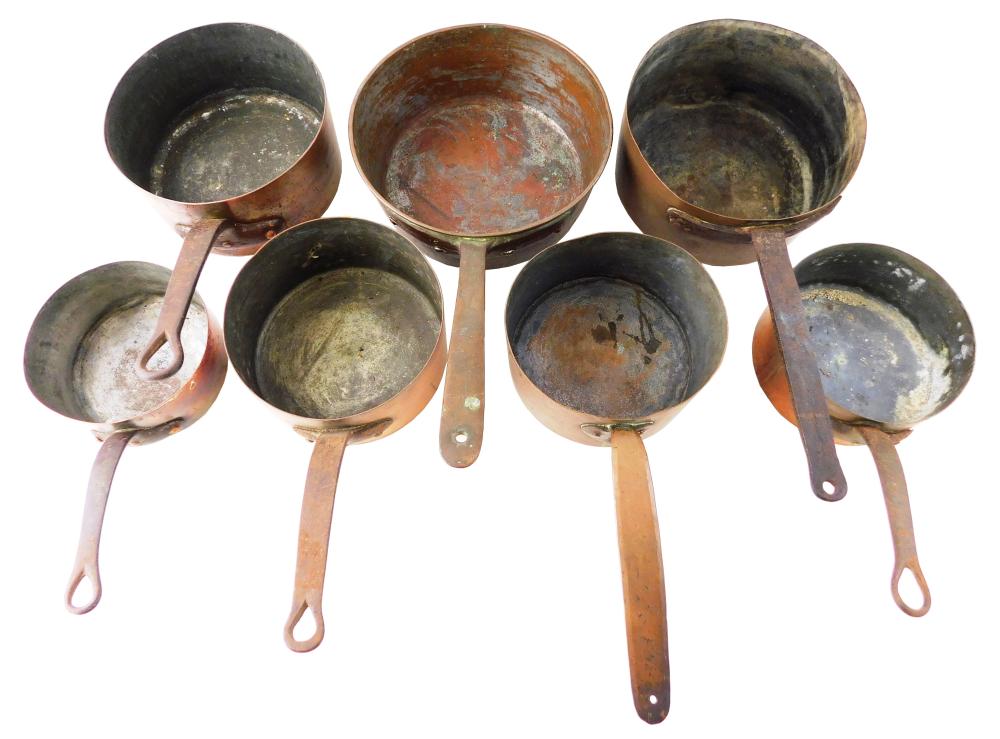 Appraisal: Seven copper cooking pots set of four graduated to diam