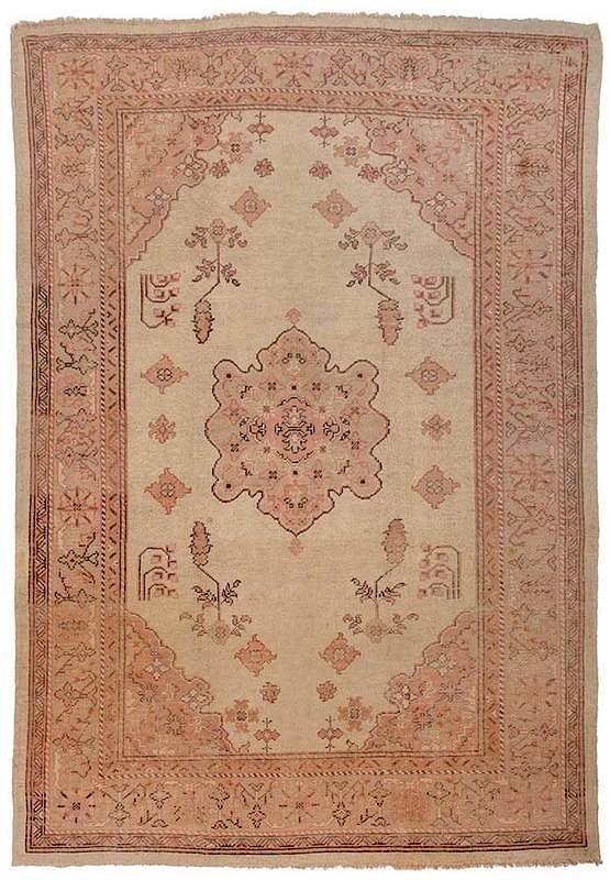 Appraisal: Oushak Carpet tan field with central orange medallion floral sprays