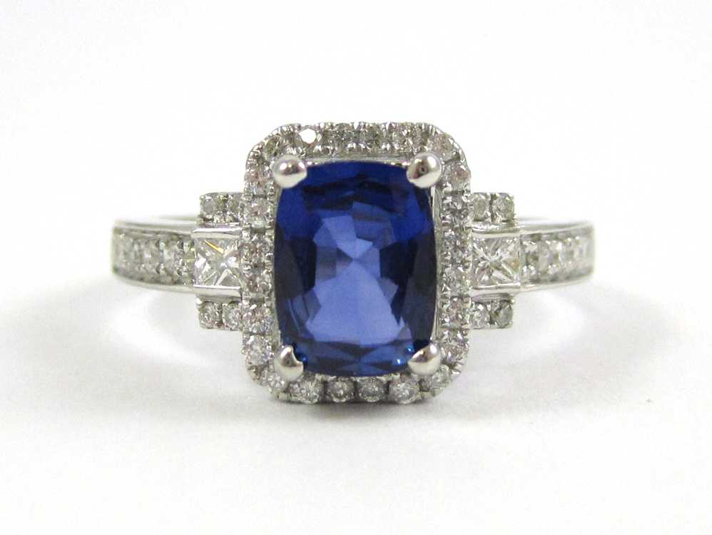 Appraisal: SAPPHIRE DIAMOND AND FOURTEEN KARAT GOLD RING The white gold