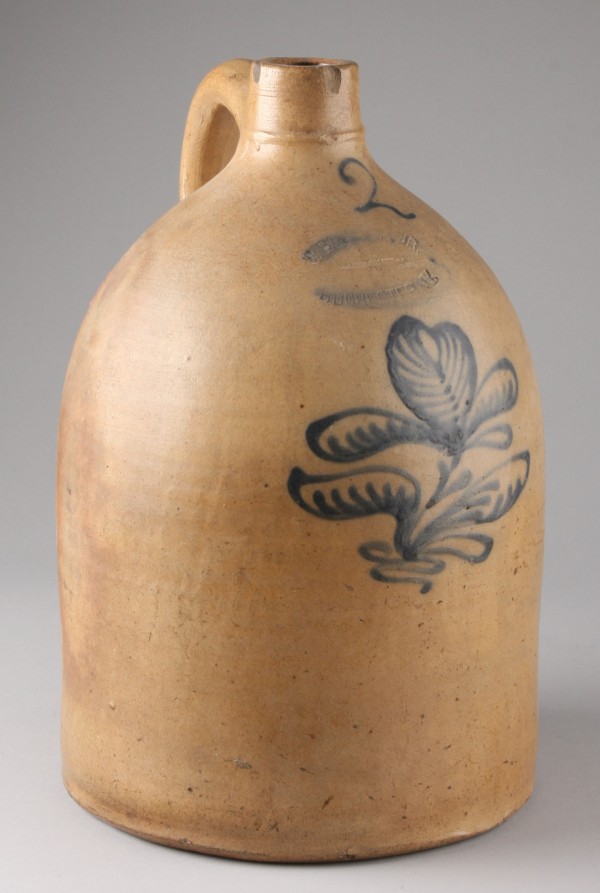 Appraisal: Two gallon jug features floral and leaf motif in cobalt