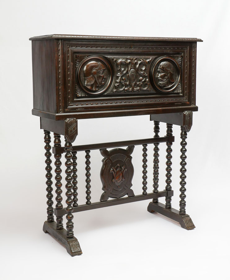 Appraisal: CARVED CONTINENTAL CAMPAIGN CHEST ON STAND Drop front chest with