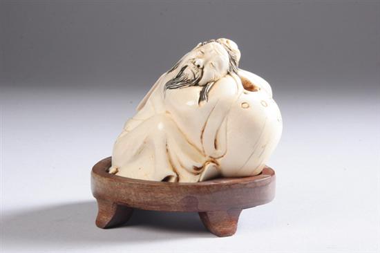 Appraisal: CHINESE IVORY FIGURAL WATER DROPPER Carved to depict man and