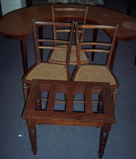 Appraisal: An Edwardian luggage rack three cane seat chairs and a