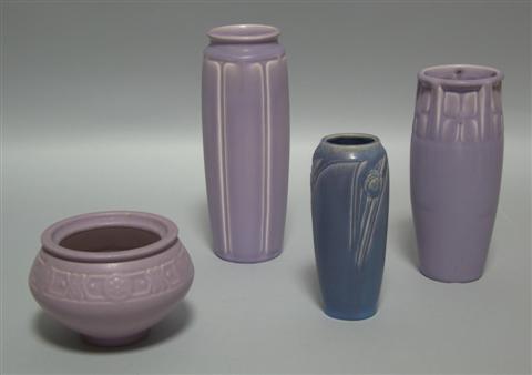 Appraisal: FOUR ROOKWOOD MATTE PURPLE VASES The first impressed date of