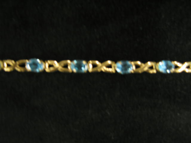 Appraisal: Blue Topaz Bracelet oval gems in k yellow gold