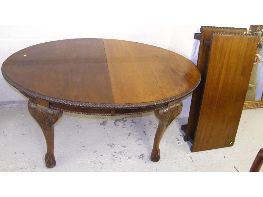 Appraisal: 's Georgian style oval mahogany extending dining table the top