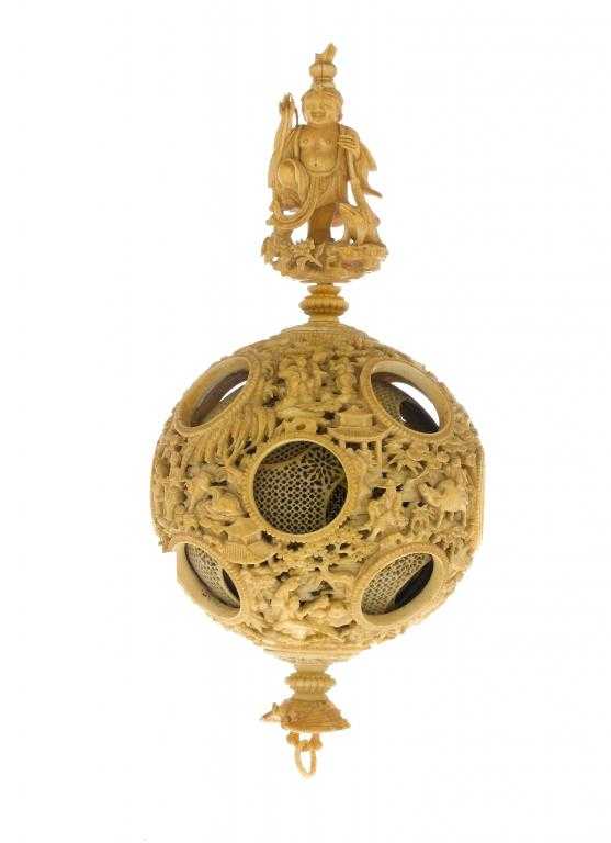 Appraisal: A CHINESE IVORY PUZZLE BALL the intricately carved outer sphere