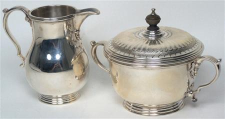 Appraisal: A modern cream jug and covered sugar bowl Richard Comyns