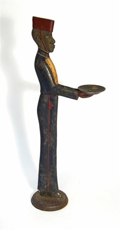 Appraisal: Cast iron figural cigarette stand th century