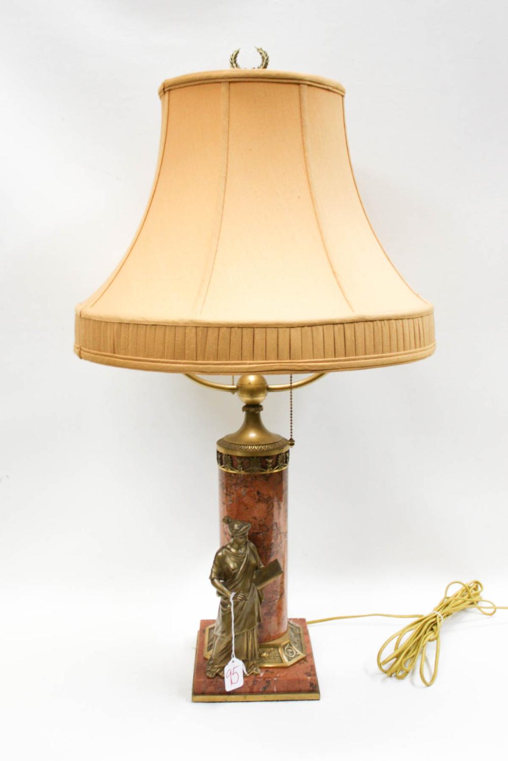 Appraisal: FRENCH MARBLE AND BRONZE TABLE LAMP featuring a standing classical