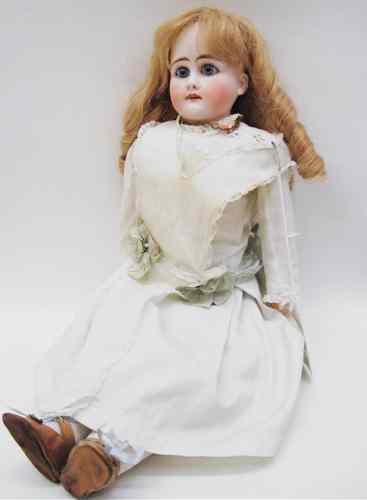 Appraisal: GERMAN BISQUE SHOULDER HEAD DOLL long blond wig fixed blue