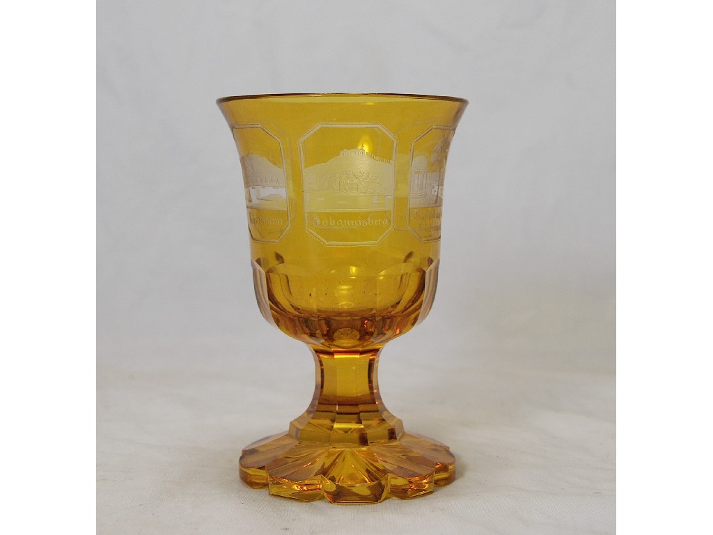 Appraisal: A th century German amber flash cut glass stemmed goblet