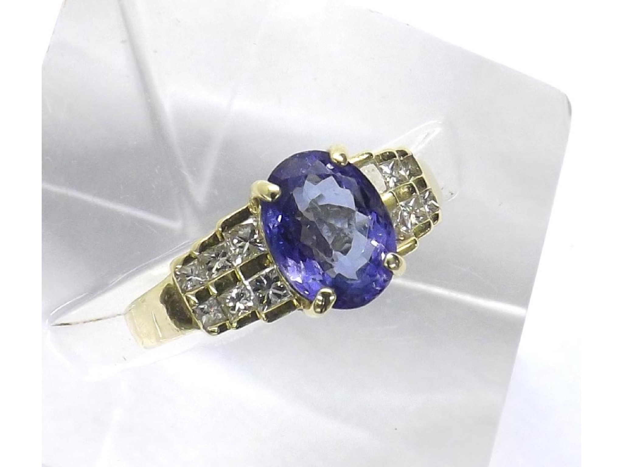 Appraisal: - -a ct tanzanite and princess-cut diamond ring the oval