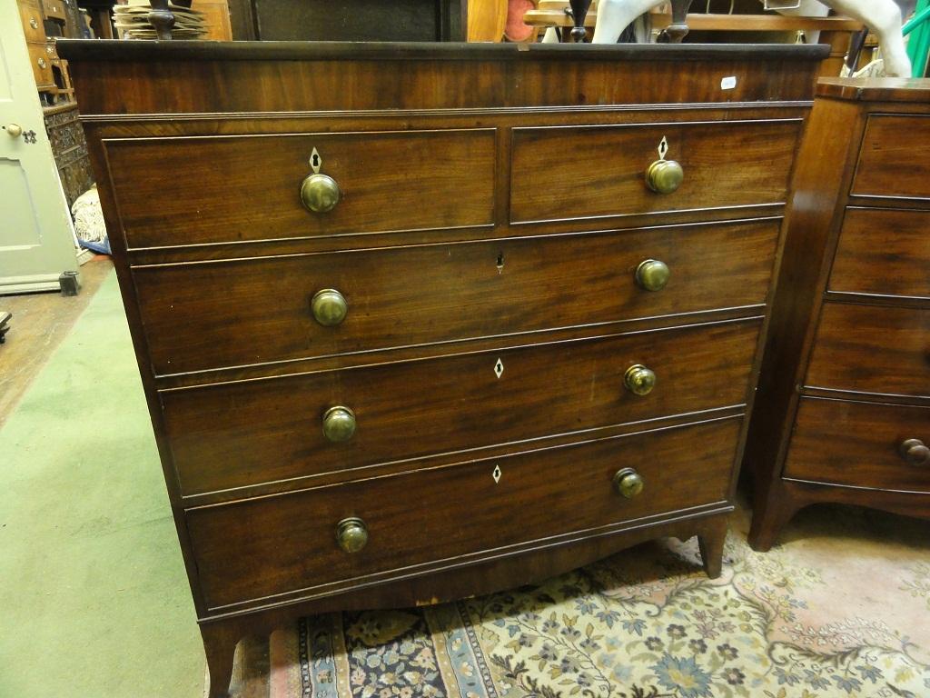 Appraisal: An early th century mahogany chest with cross banded top