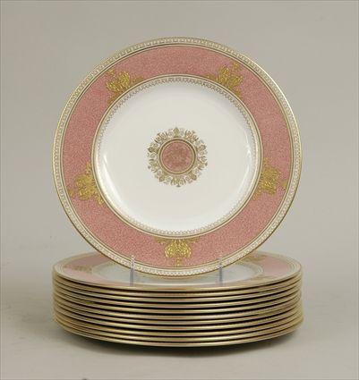 Appraisal: Twelve Wedgwood Gilt Decorated and Pink-Banded Porcelain Dinner Plates Marked