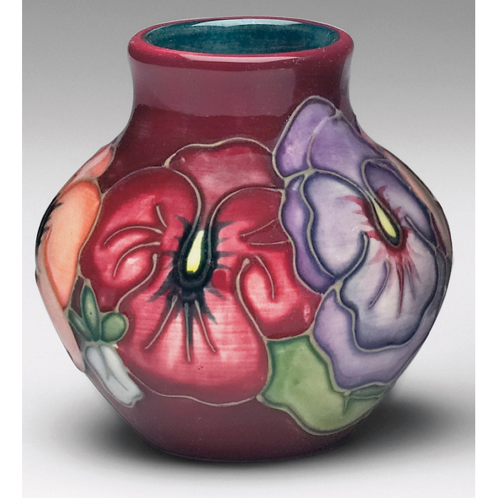 Appraisal: Moorcroft vase pansy design printed mark and painted initials ''h