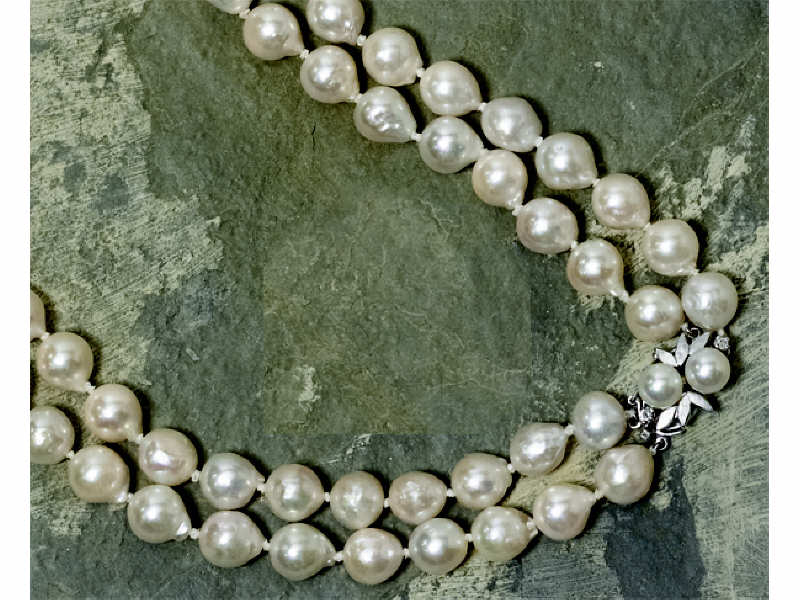 Appraisal: DOUBLE STRAND PEARLS Approximately - mm inch length Pearls have