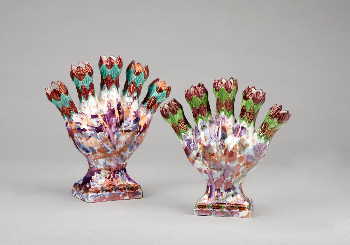 Appraisal: TWO NEARLY IDENTICAL ENGLISH PEARLWARE MOTTLED LUSTRE QUINTAL VASES CIRCA