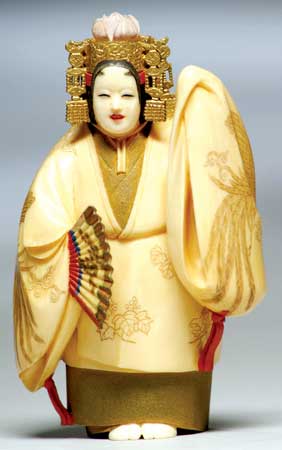 Appraisal: FINE CARVED AND LACQUERED IVORY OKIMONO Superbly carved and detailed