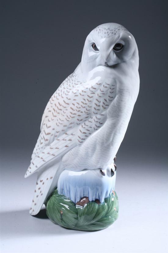 Appraisal: ROYAL COPENHAGEN PORCELAIN FIGURE OF SNOWY OWL Underglaze blue wave