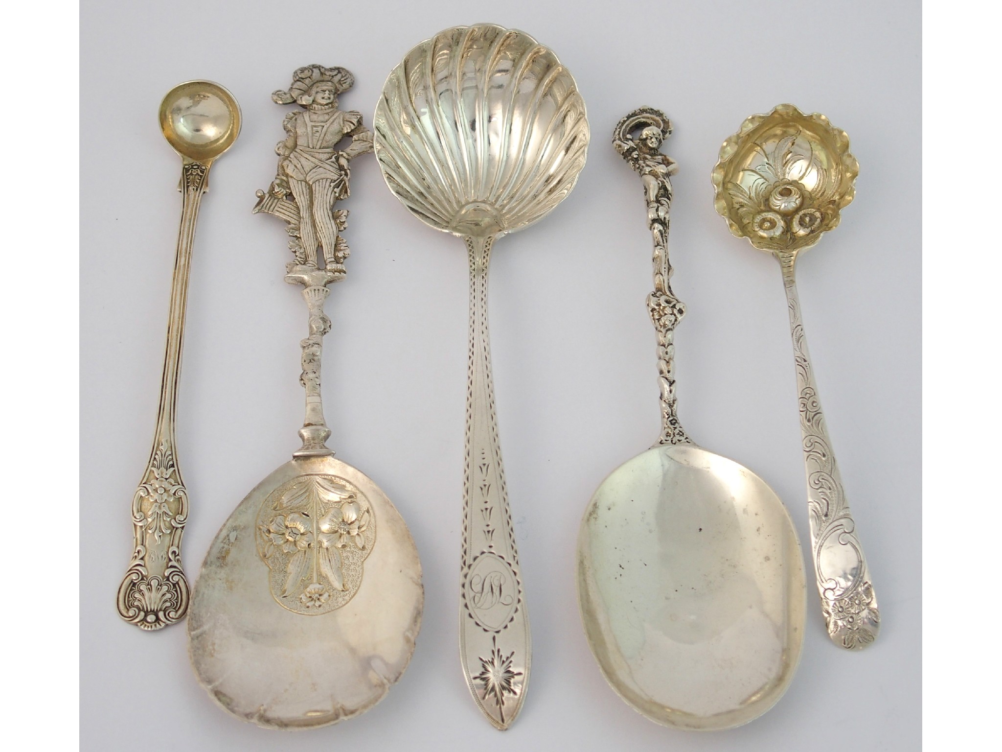 Appraisal: A continental silver serving spoonwith London import marks the shell