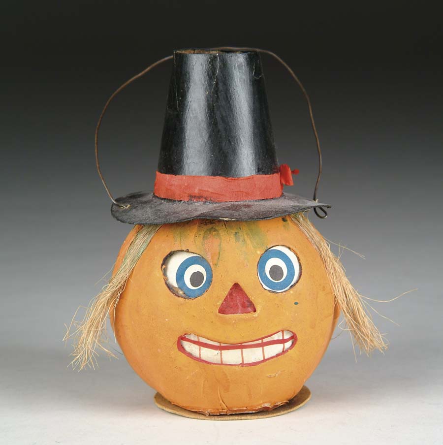 Appraisal: PILGRIM HAT JACK-O-LANTERN Paper mache pumpkin with paper insert for