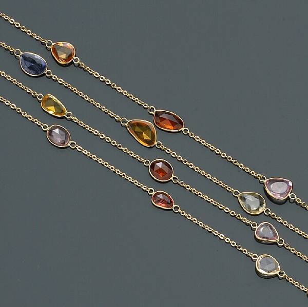 Appraisal: A multi-color sapphire chain collet-set with sapphires of various shapes