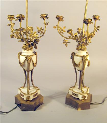 Appraisal: Pair of Louis XV style gilt bronze and marble candelabra