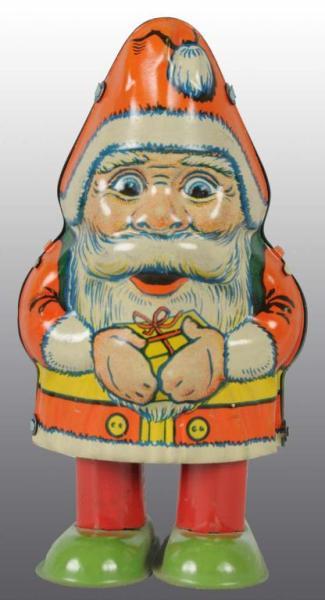 Appraisal: Tin Chein Santa Claus Wind-Up Toy Description Working Marked J