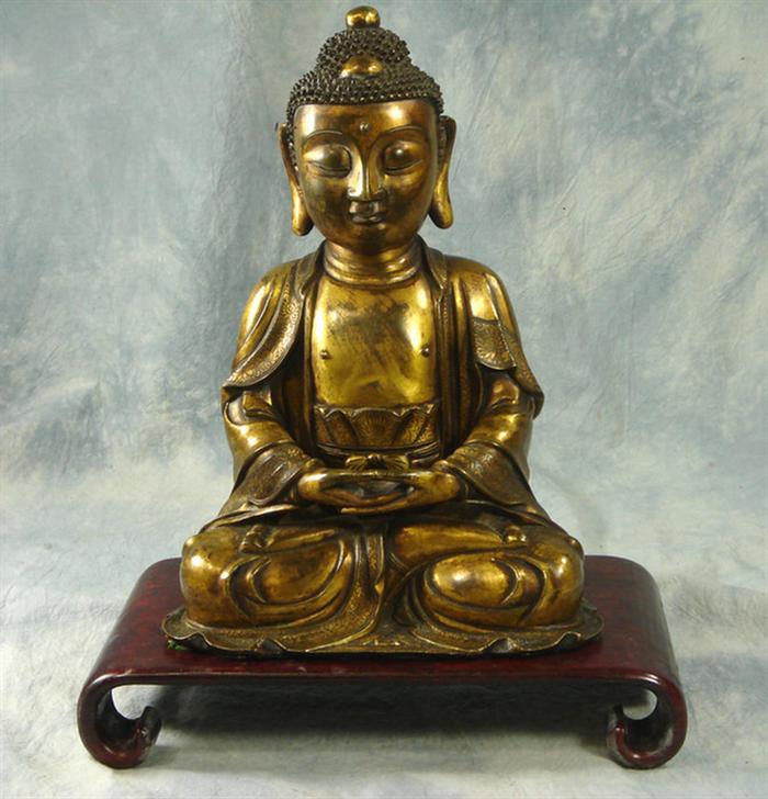 Appraisal: Gilt bronze seated Buddha figurine engraved decoration on robe high