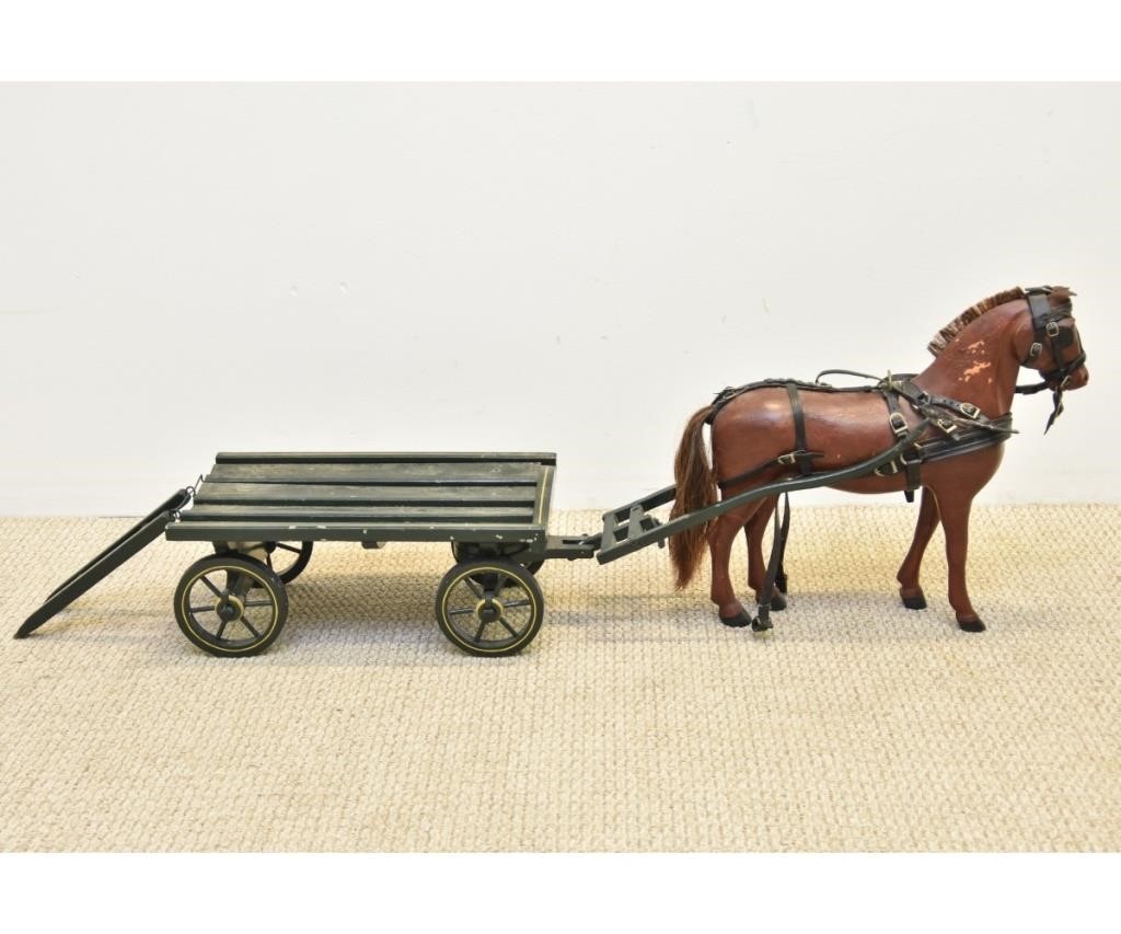 Appraisal: Finely carved wood horse and wagon circa horse h x