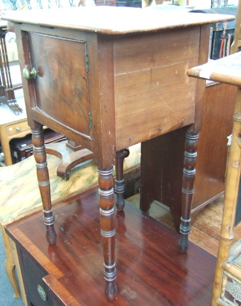 Appraisal: A th century and later mahogany pot cupboard with single