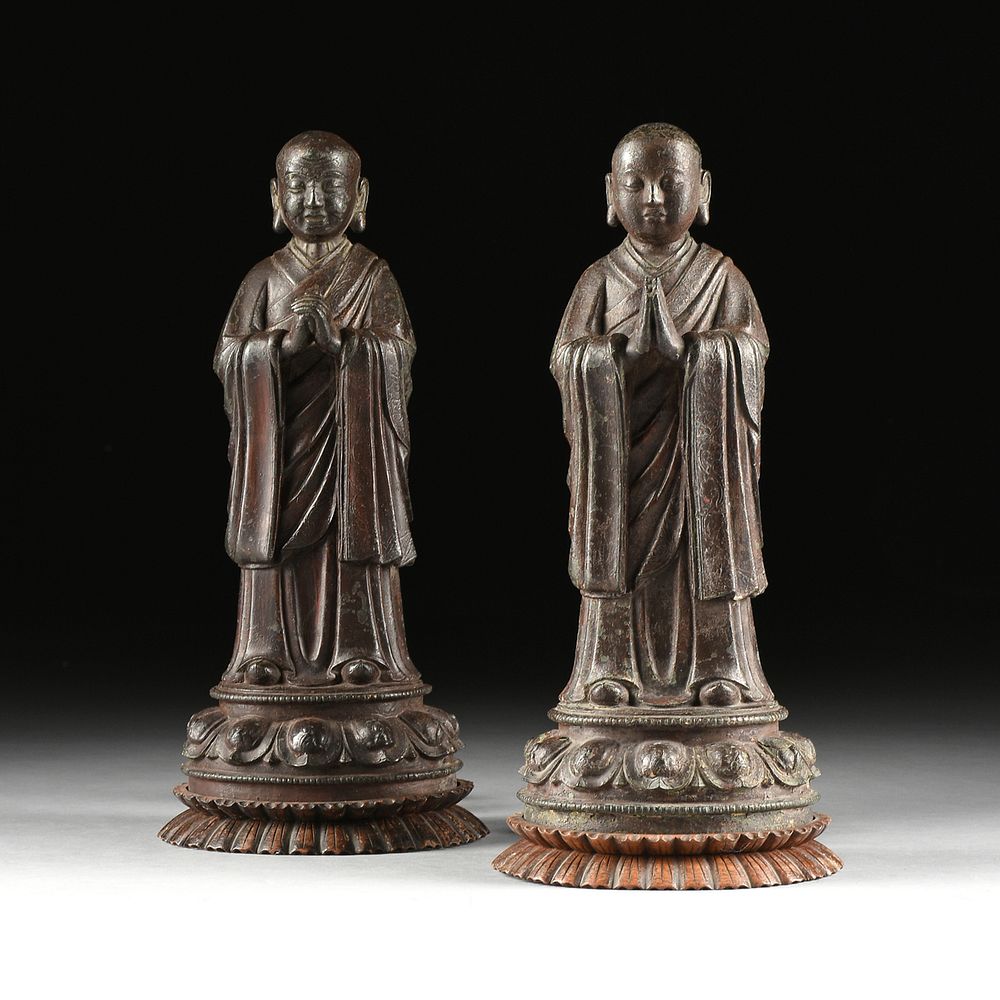 Appraisal: A PAIR OF MING DYNASTY STYLE ENAMELED BRONZE DISCIPLES OF