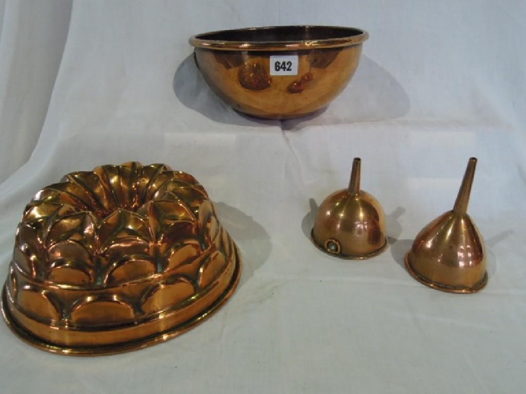 Appraisal: A small collection of copper kitchenalia including a jelly mould