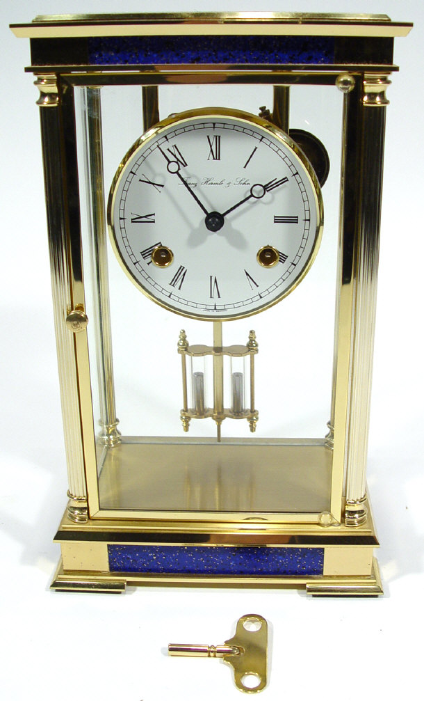 Appraisal: German brass cased mantel clock with enamel dial and mercury